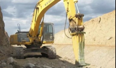 Rock breaker machine от City Big: New Holland 1 photos