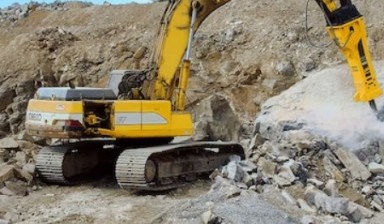 Rock breaker machine от I Online: Caterpillar 2 photos